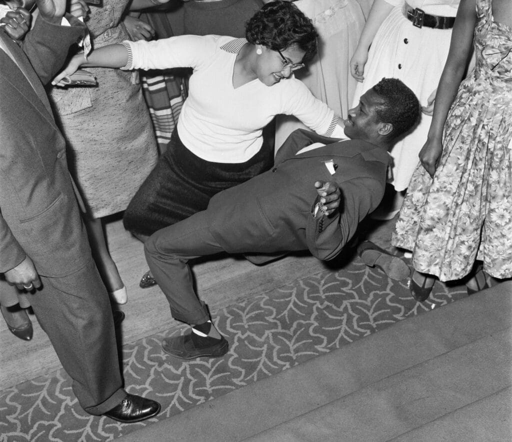 London's Caribbean community | A black-and-white photo of a man and a woman dancing at the very first Notting Hill Carnival