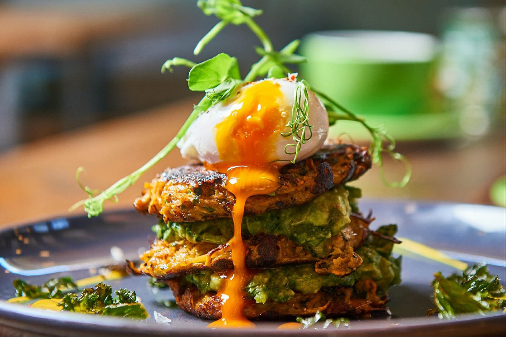 A poached egg stacked on fritters at Brother Marcus in Borough Market