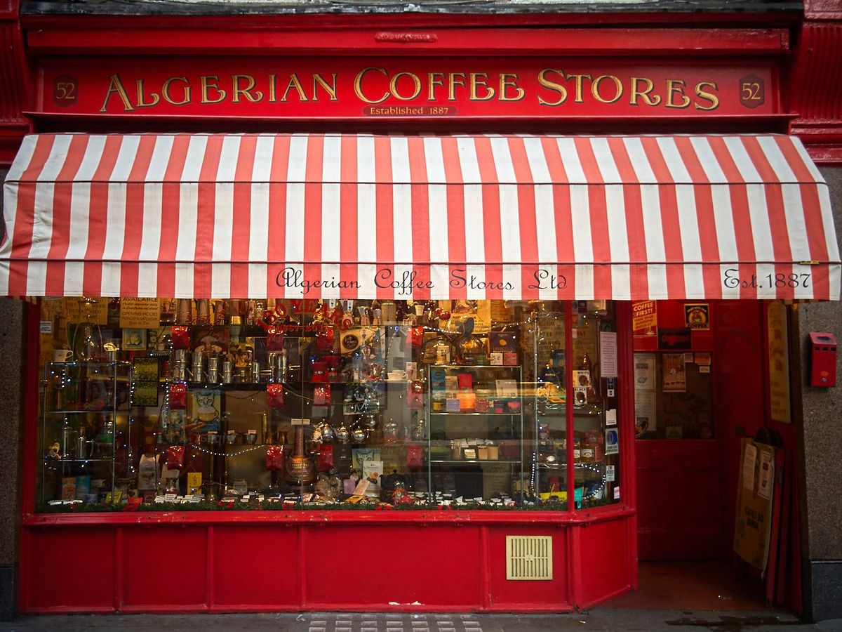 The red exterior of Algerian Coffee Stores, a London Soho institution