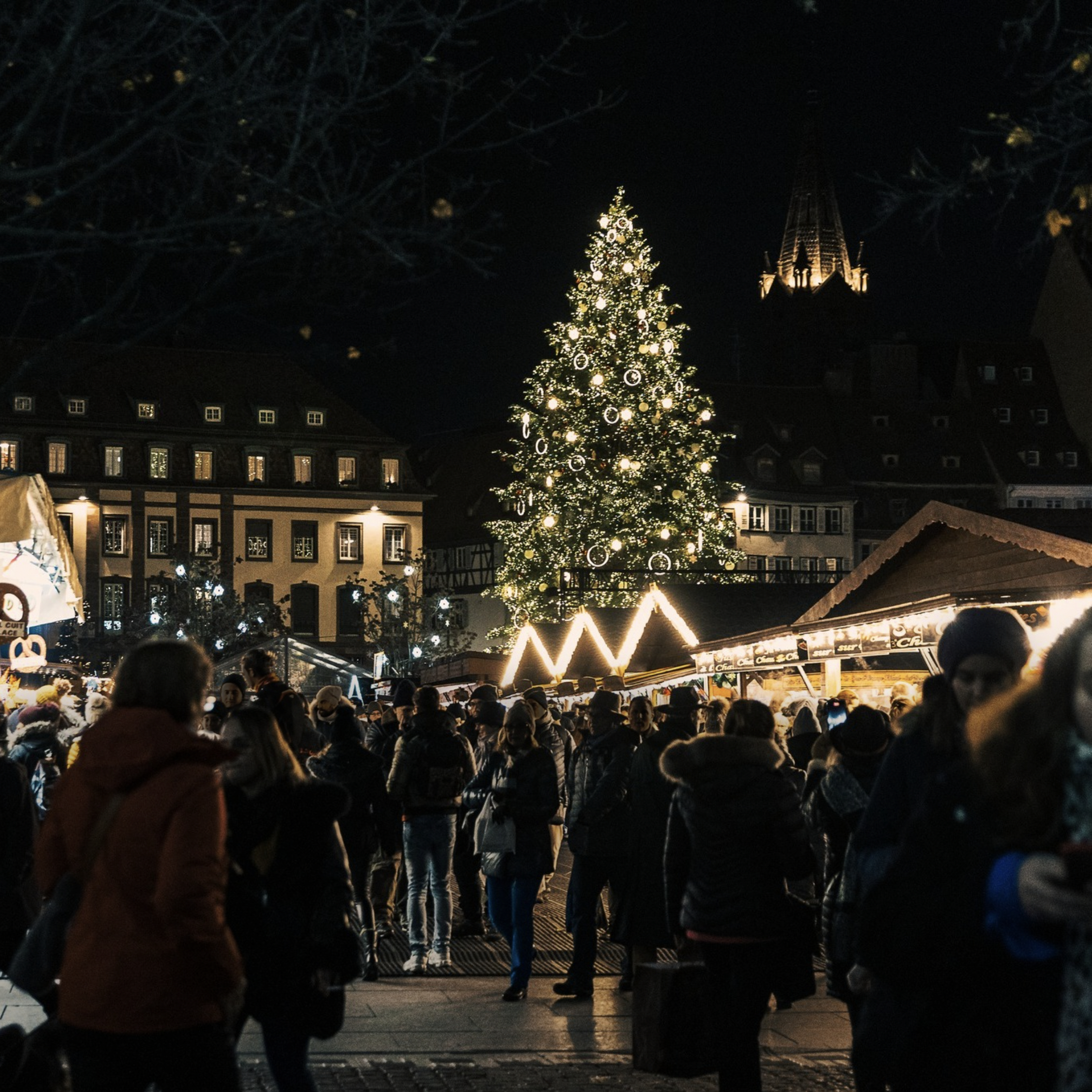 A quaint street in Strasbourg, bedecked with festive trimmings