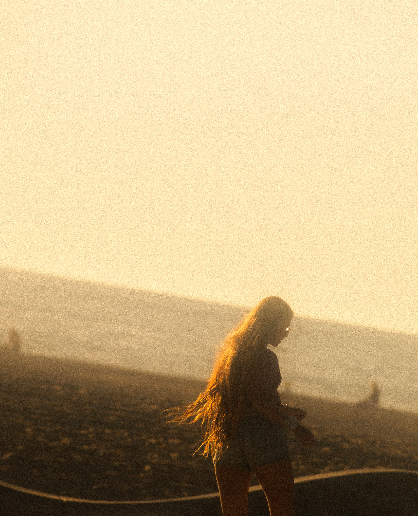 Focal Point, Erik Melvin | A figure walking along the coast in LA. Photo by Erik Melvin