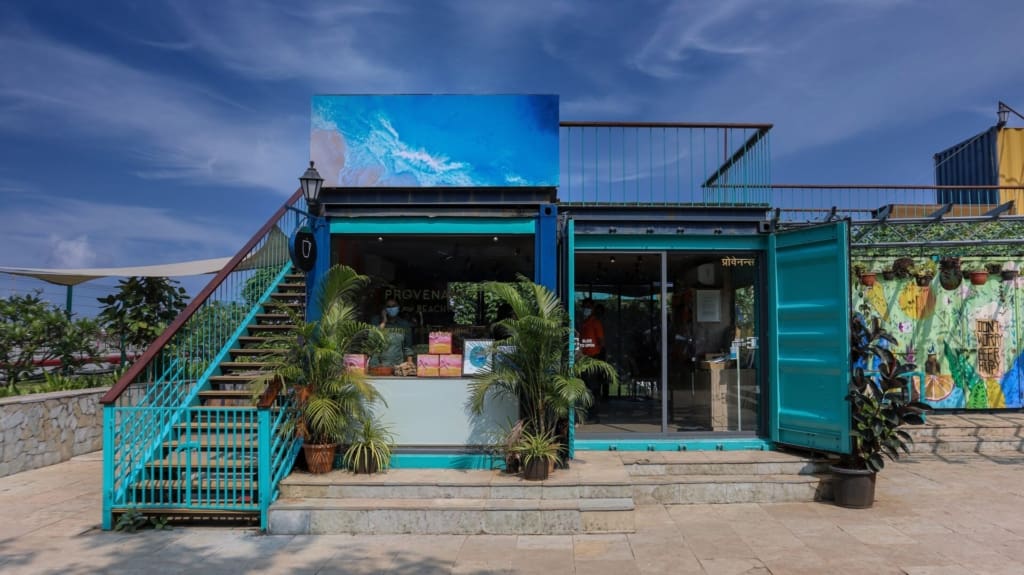 A weekend guide to Alibaug | A bright blue shipping container converted into a shop at Sunny Side Market at Mandwa Jetty in Alibaug