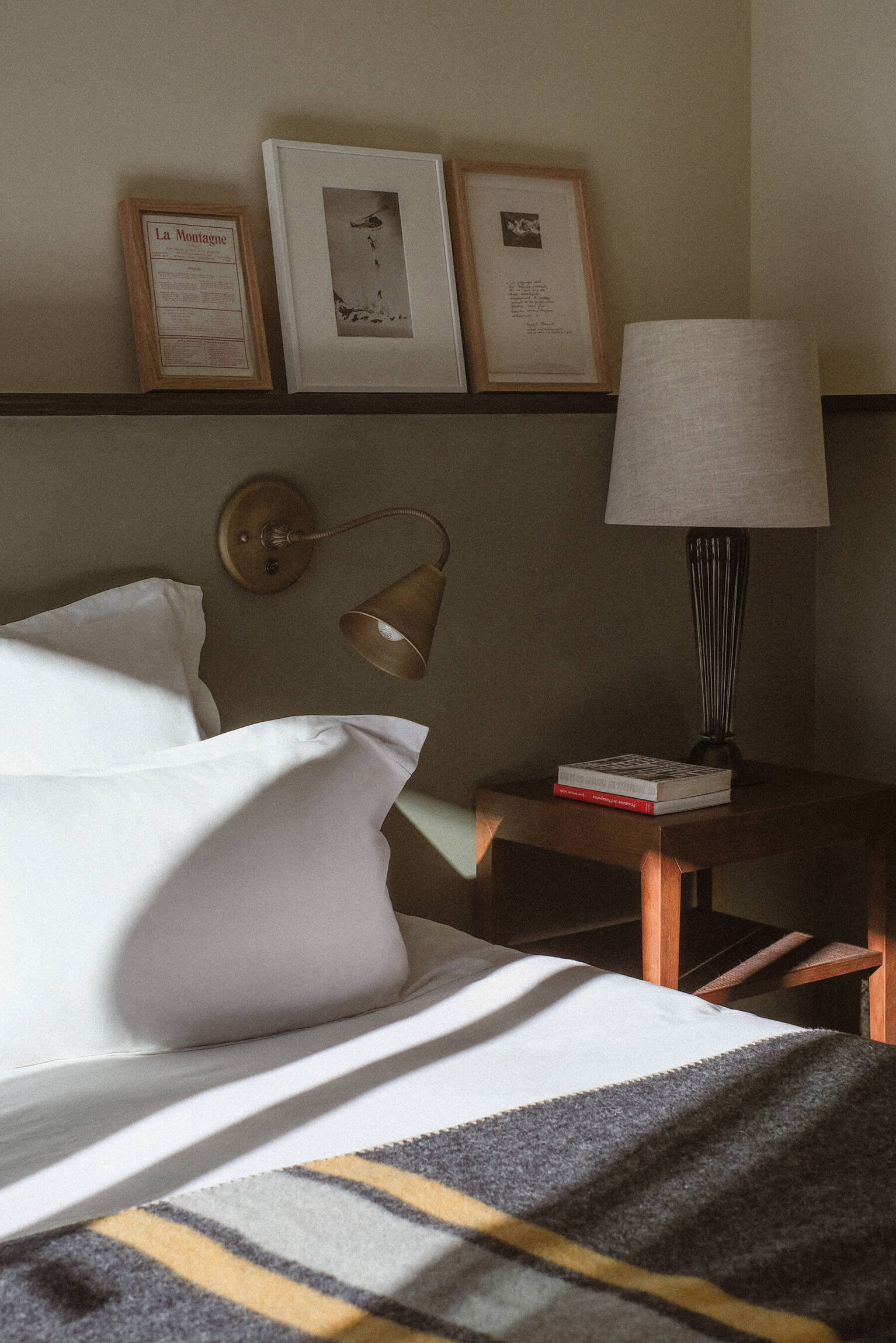 The most spectacular places to stay in the Alps this winter | A bed detail in a room at Le Fitz Roy, Val Thorens