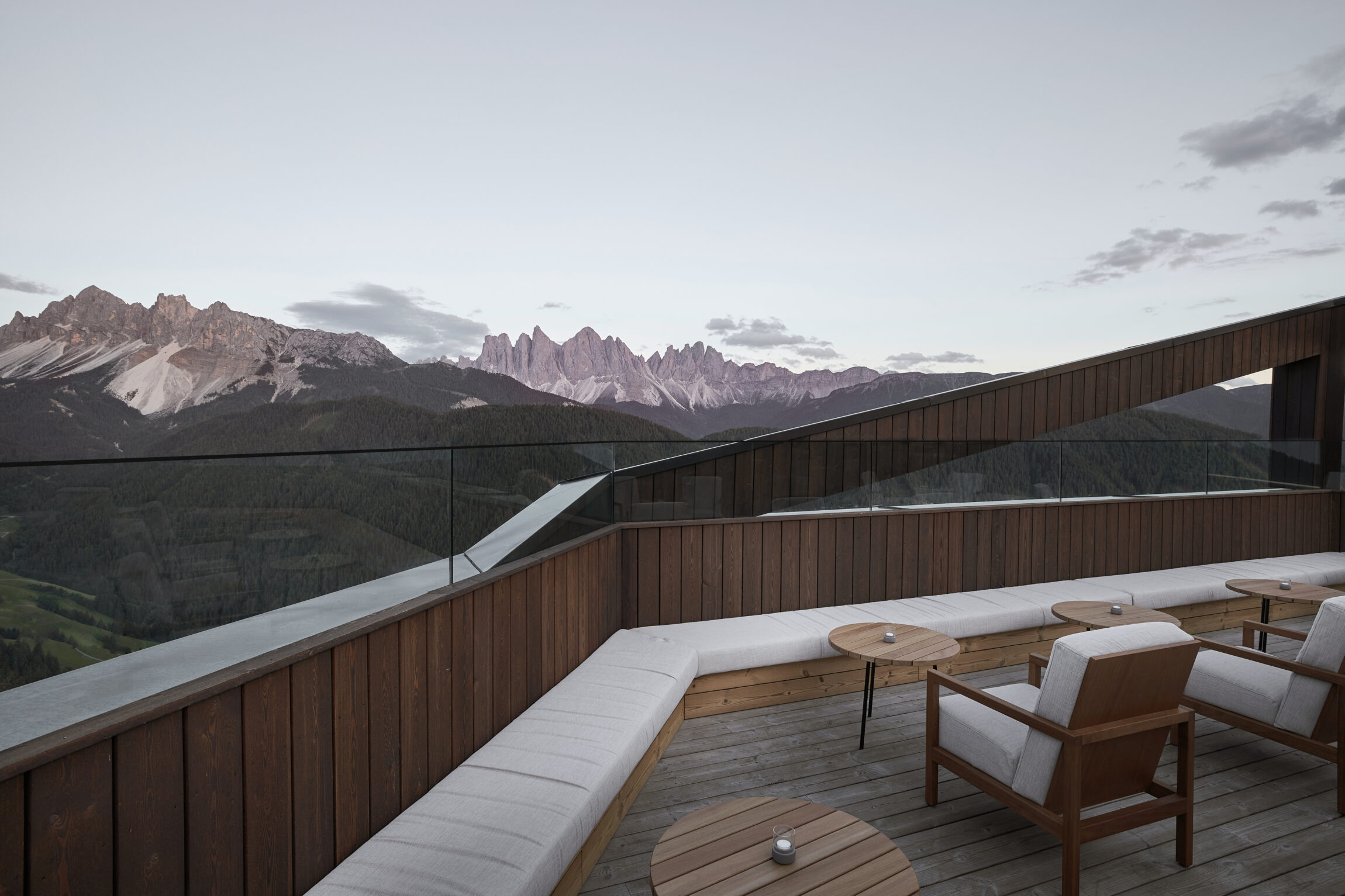 The most spectacular places to stay in the Alps this winter | A secluded terrace overlooks the Dolomites at Forestis