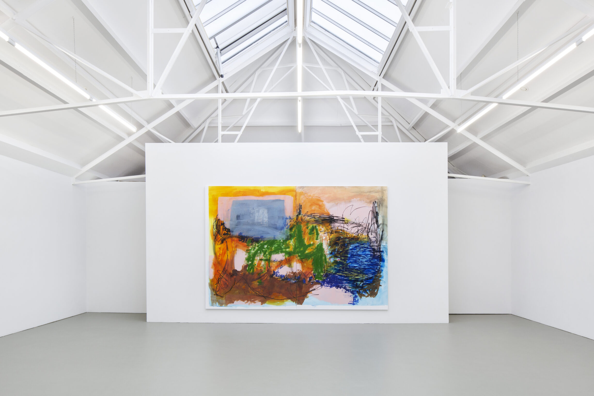 The best museums and art galleries in Amsterdam | Large colourful artwork against a white walled gallery with a soaring pitched roof