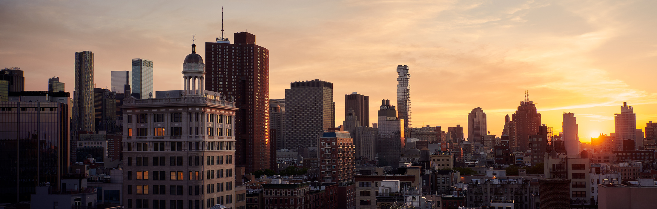 A picture of New York City's skyline at sunset