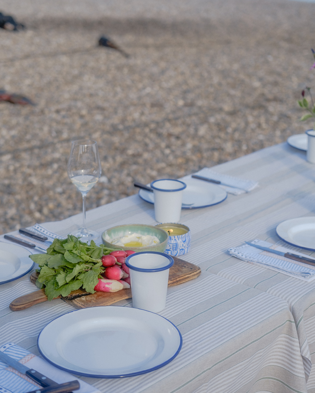 A table ready for dinner on a beach near Glebe House, Devon.