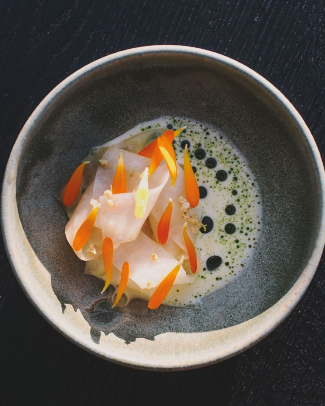 Kohlrabi, pickled elderflower and smoked whey butter seasoned with⁠ a garum made with mackerel trim at Grace & Savour.