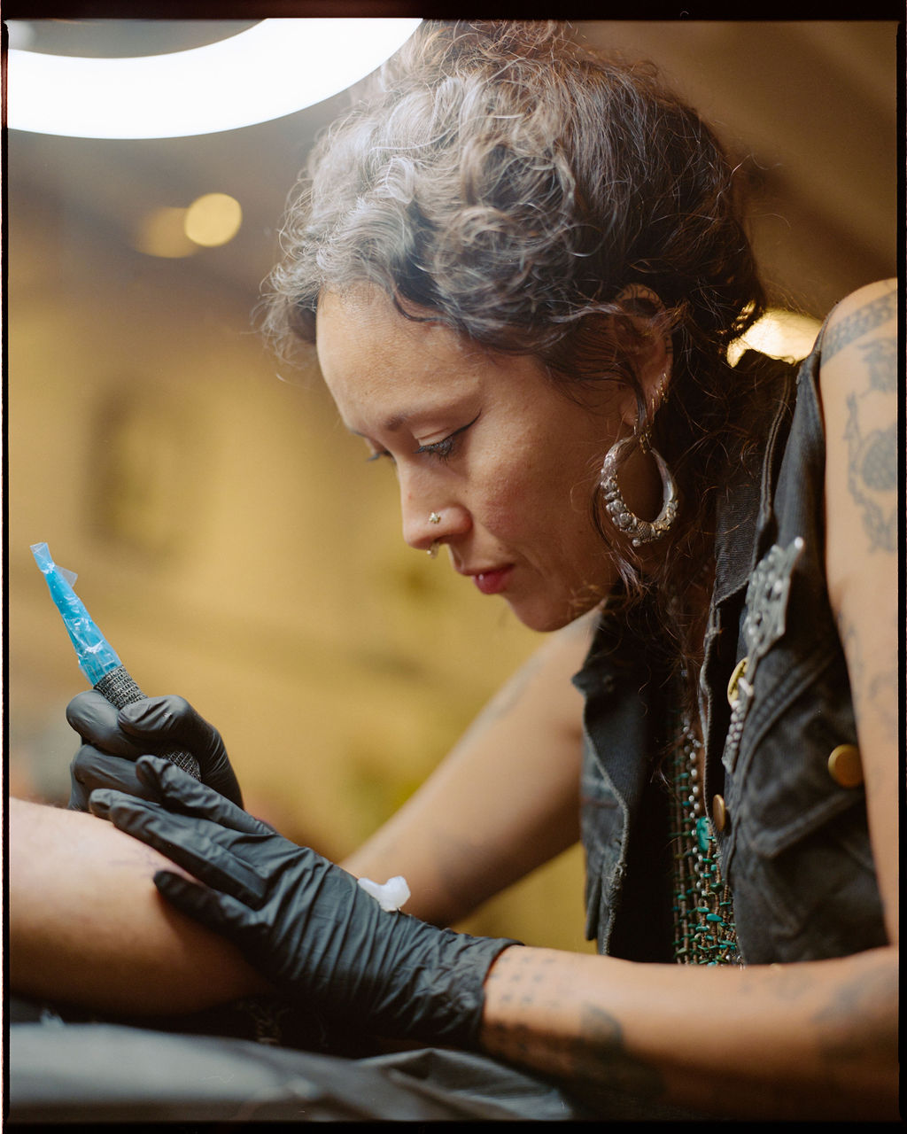 An interview with Tati Compton | Tati tattooing in her LA studio