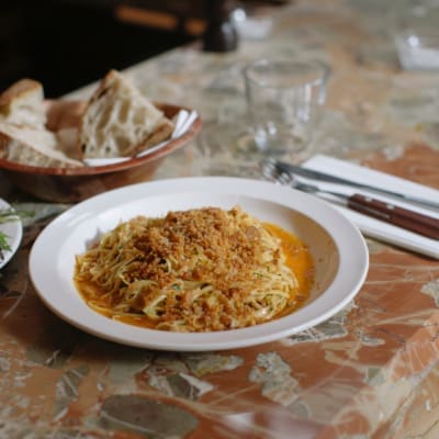 Shoreditch and Spitalfields | a pasta dish on a stone table at Padella