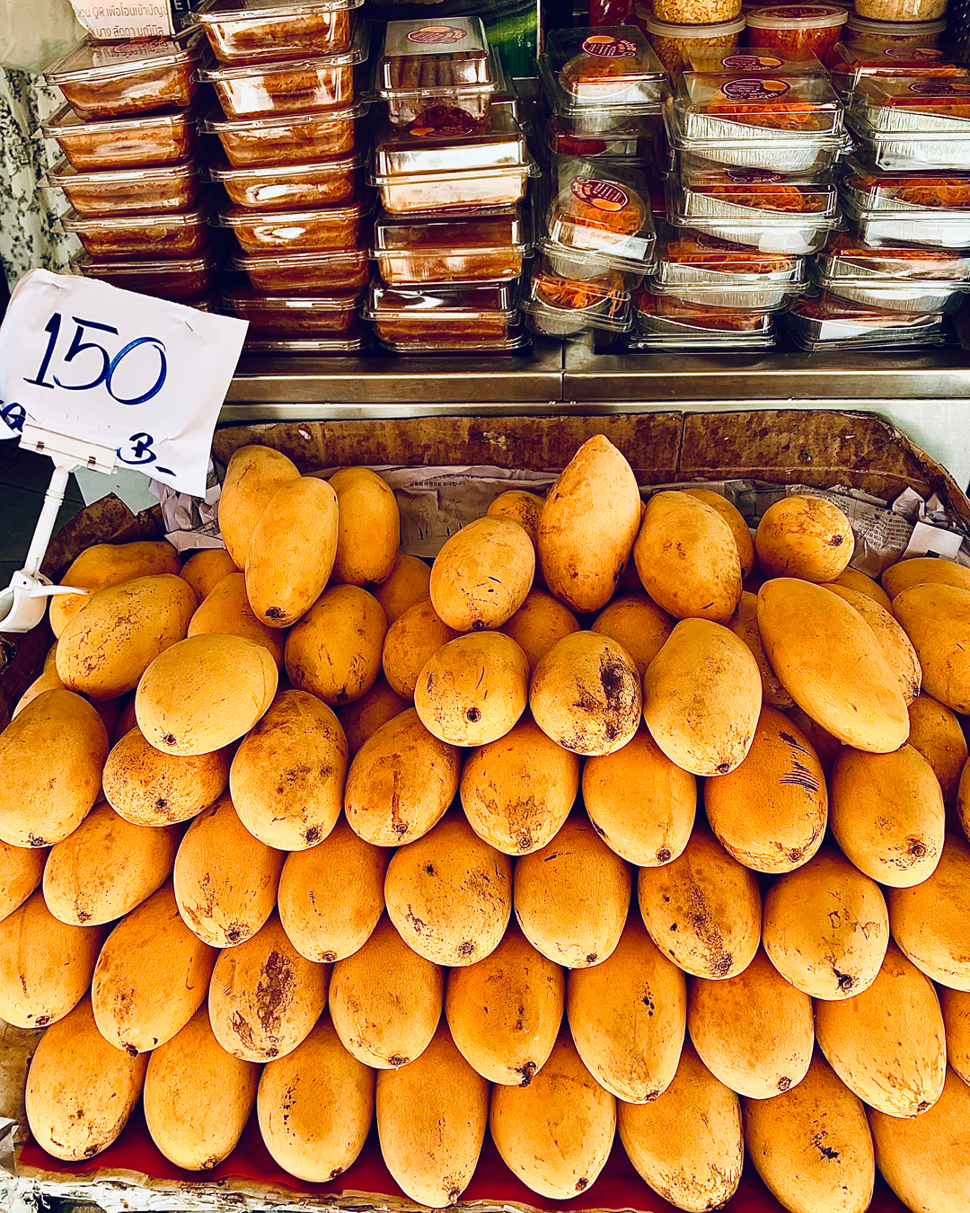 Mangoes can be purchased whole or freshly sliced at Mae Varee Mango Sticky Rice