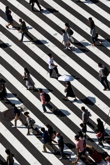 My City: Tokyo | Pedestrians walking across Shibuya Crossing in Tokyo.