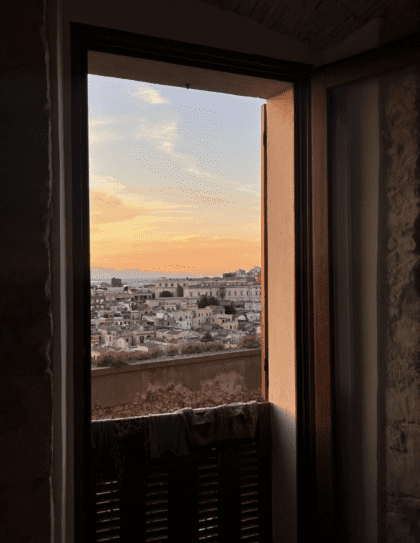 A view out a window of Cagliari, Italy, courtesy of Alice Tate