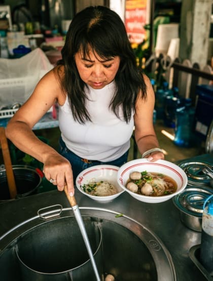 A trip to Thailand with Saiphin Moore, founder of Rosa's Thai | Saiphin making meatball noodle soup at the restaurant next to her childhood home in Khao Kho