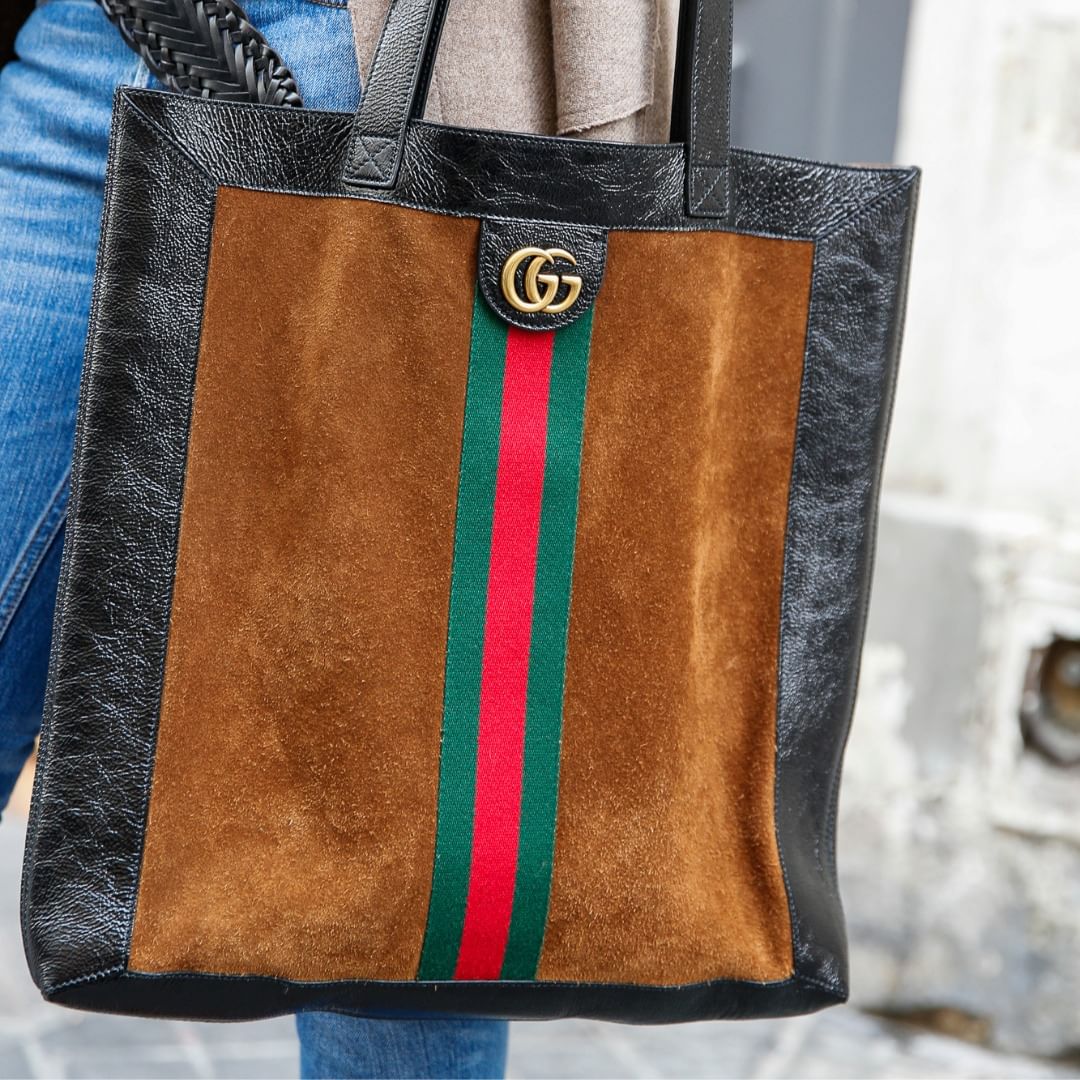 The best vintage shops in Paris | A vintage Gucci bag pictured at vintage shop Chercheminippes