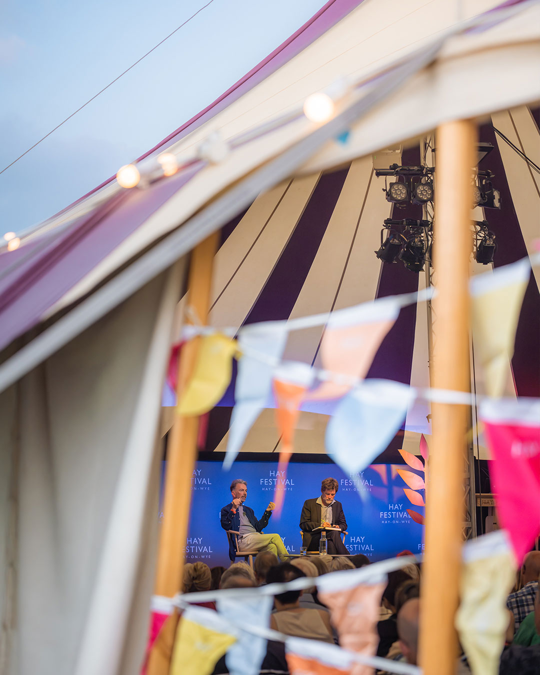 Bunting lines the tents at Hay Festival