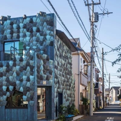 The striking facade of Wakuni Shoten coffee shop in Tokyo, designed by Kengo Kuma.