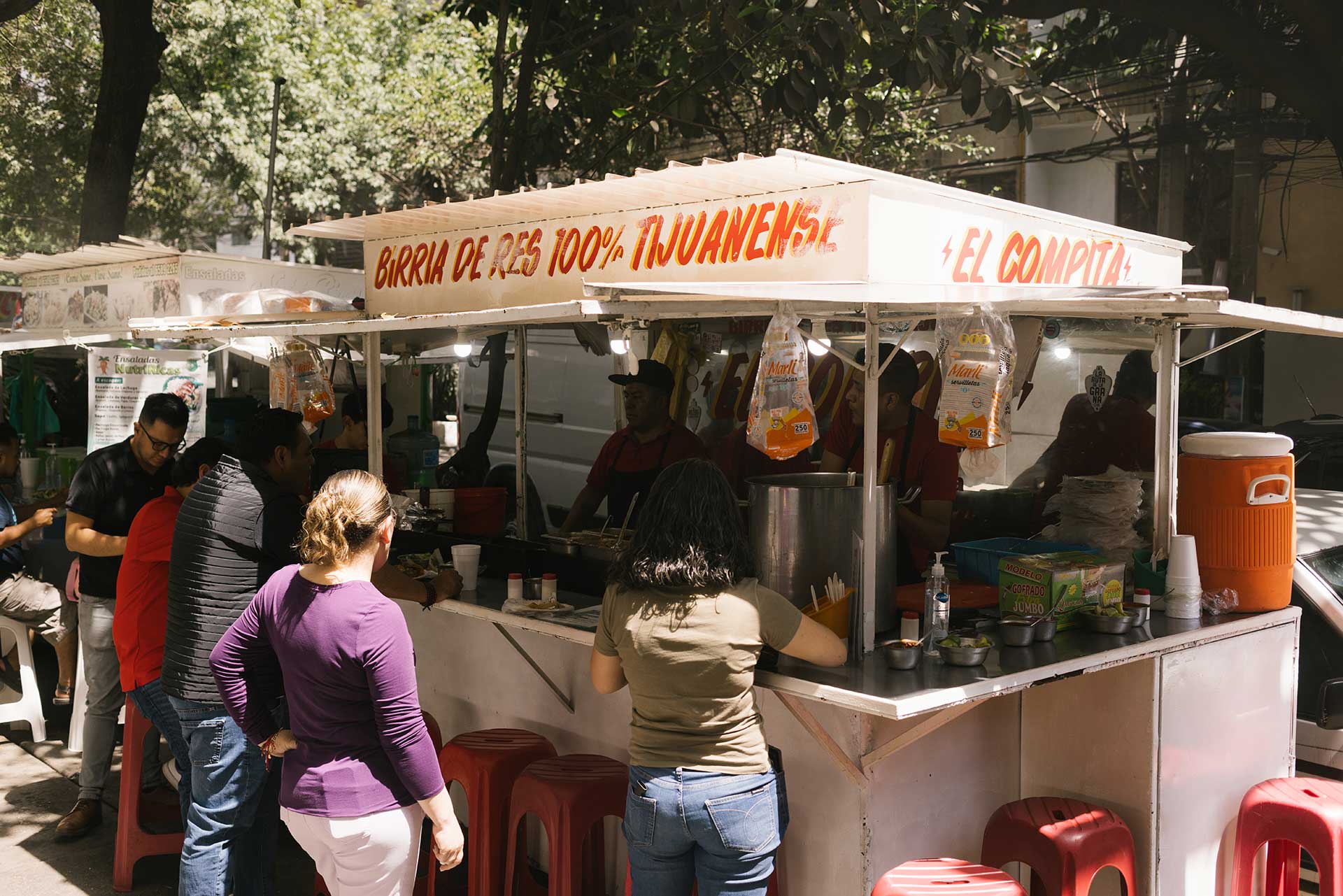 People queuing outside El Compita Taqueria in Mexico City