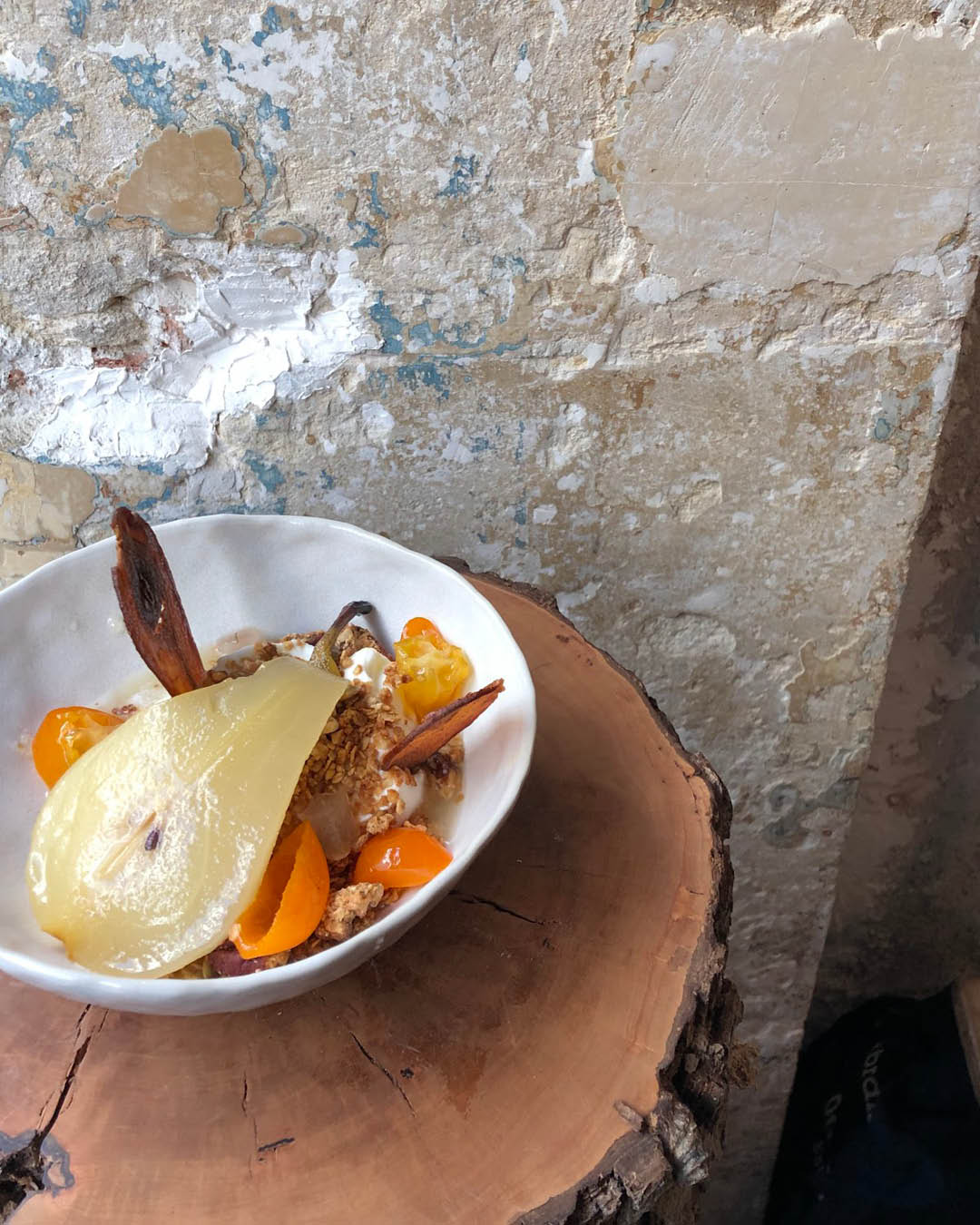 A healthy bowl with a pear served at Dreamin' Man coffee shop in Paris.