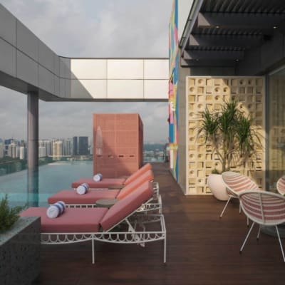 Sun loungers by the rooftop pool at Las Palmas, Singapore.