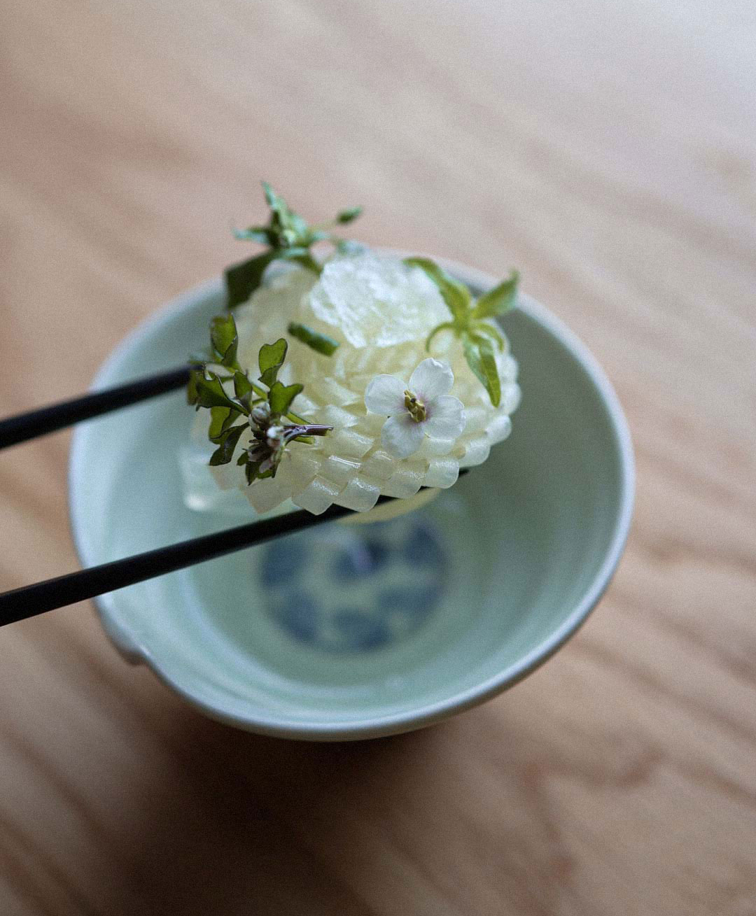 Kimchi dish serve with herbs and elderflower oil