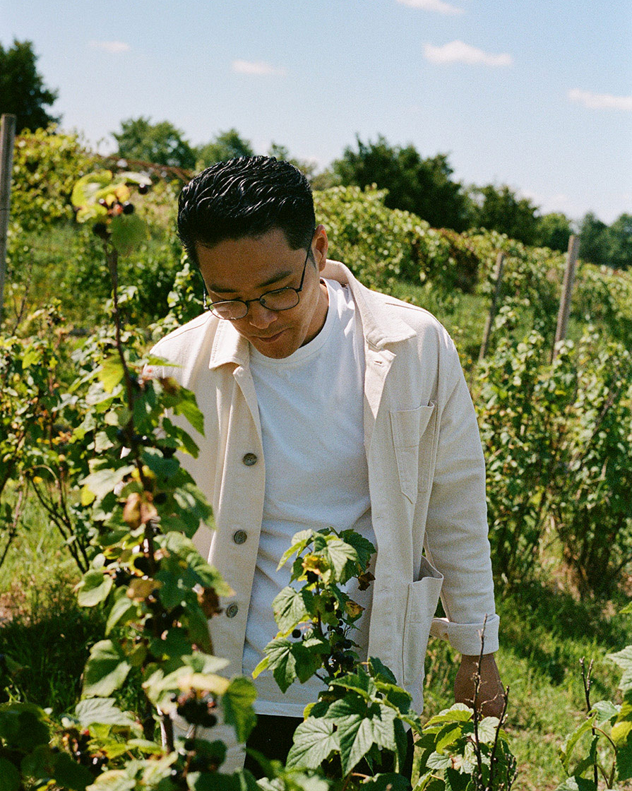 Kristian Baumann in a strawberry field