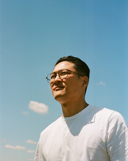 Chef Kristian Baumann in a strawberry field in Copenhagen