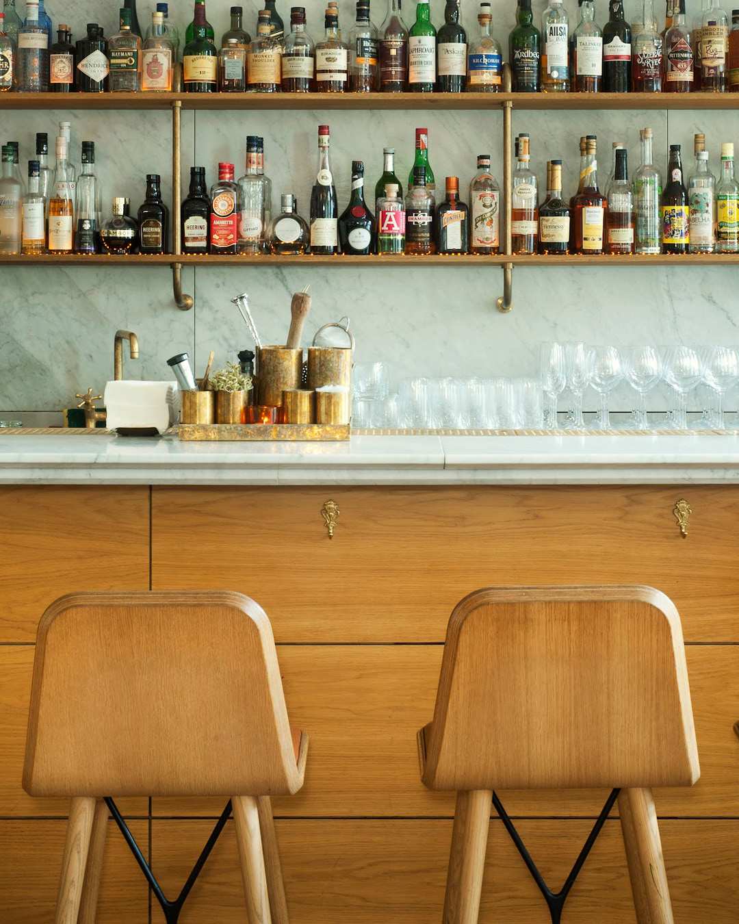 Bottles line the shelves of the Ruby bar in Copenhagen K