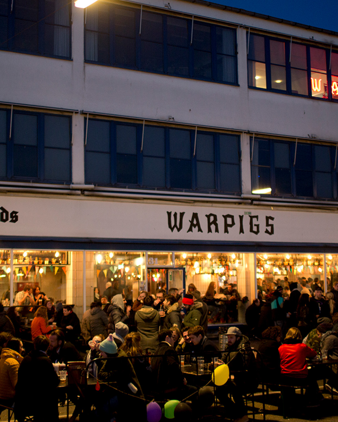 Crowds enjoy the outdoor space at Warpigs bar in Vesterbro