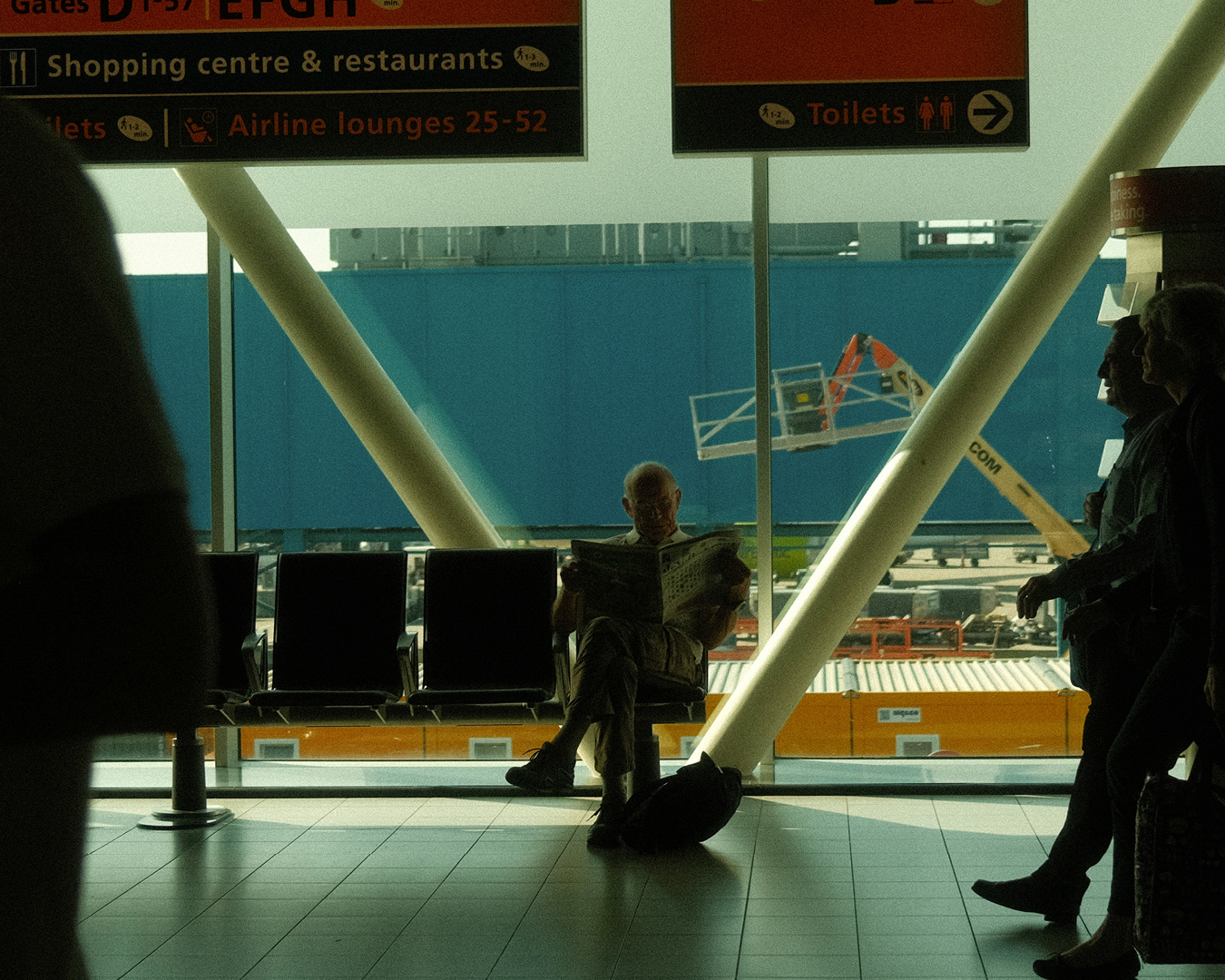 A man sits in an airport