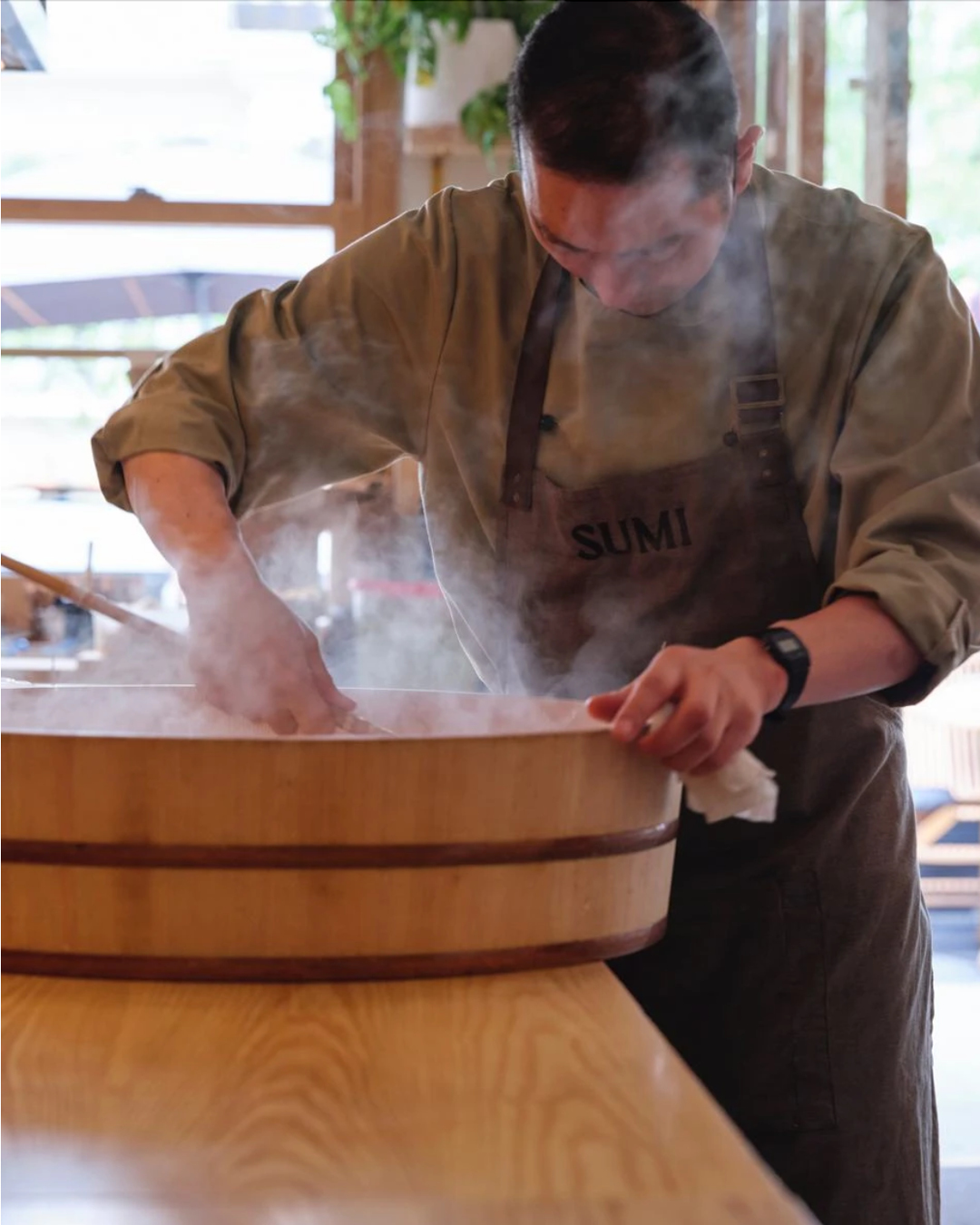 A chef prepares food at Sumi restaurant in Notting Hill