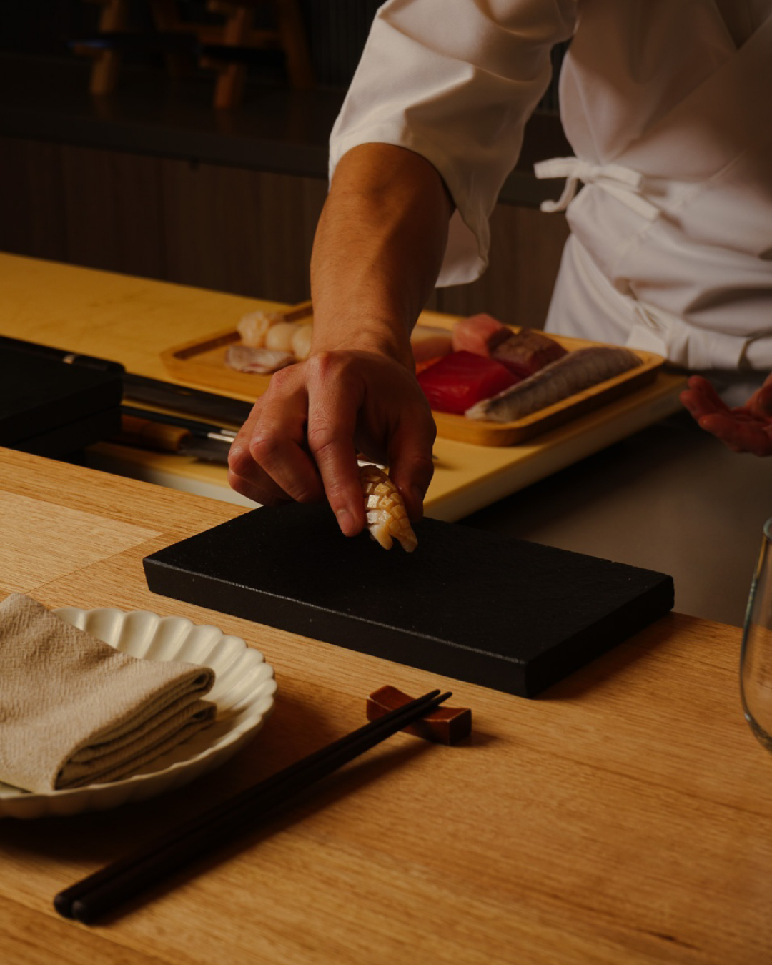 Chef preparing nigiri sushi at Sushi On in Kew, Melbourne