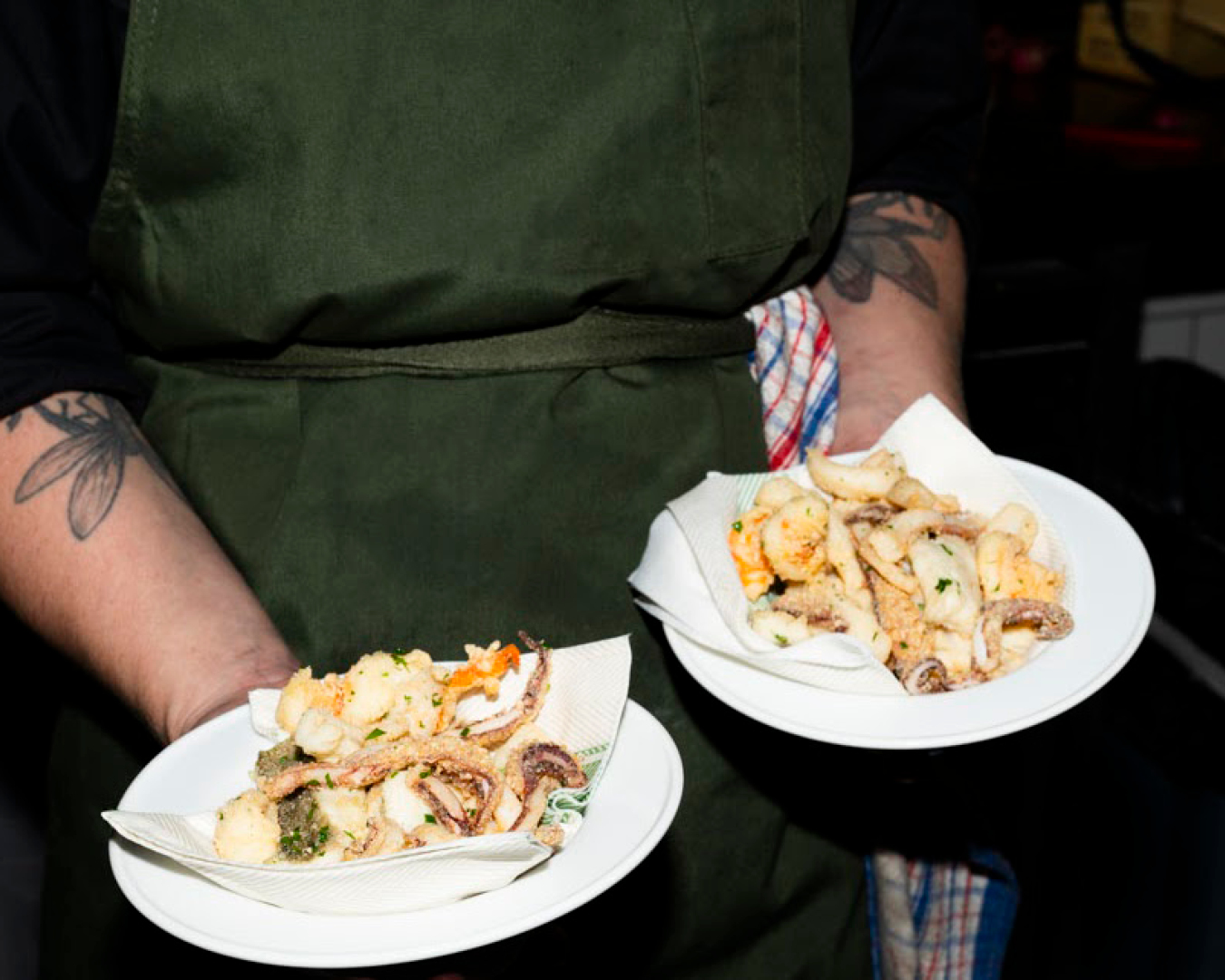 Freshly served seafood plates at Bar Olo in Cartlon, Melbourne