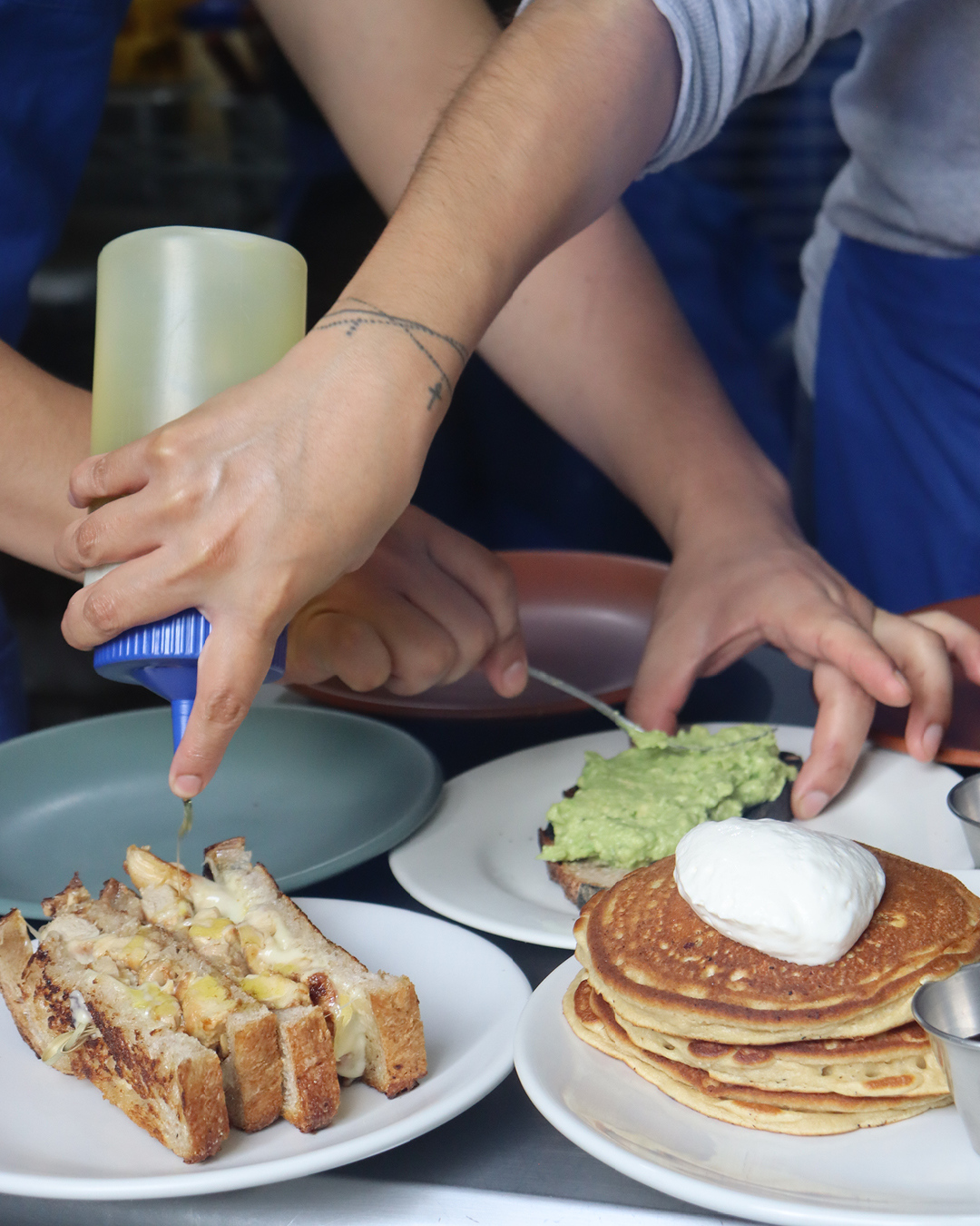 Chefs preparing food at Onnno Panaderia, Oaxaca