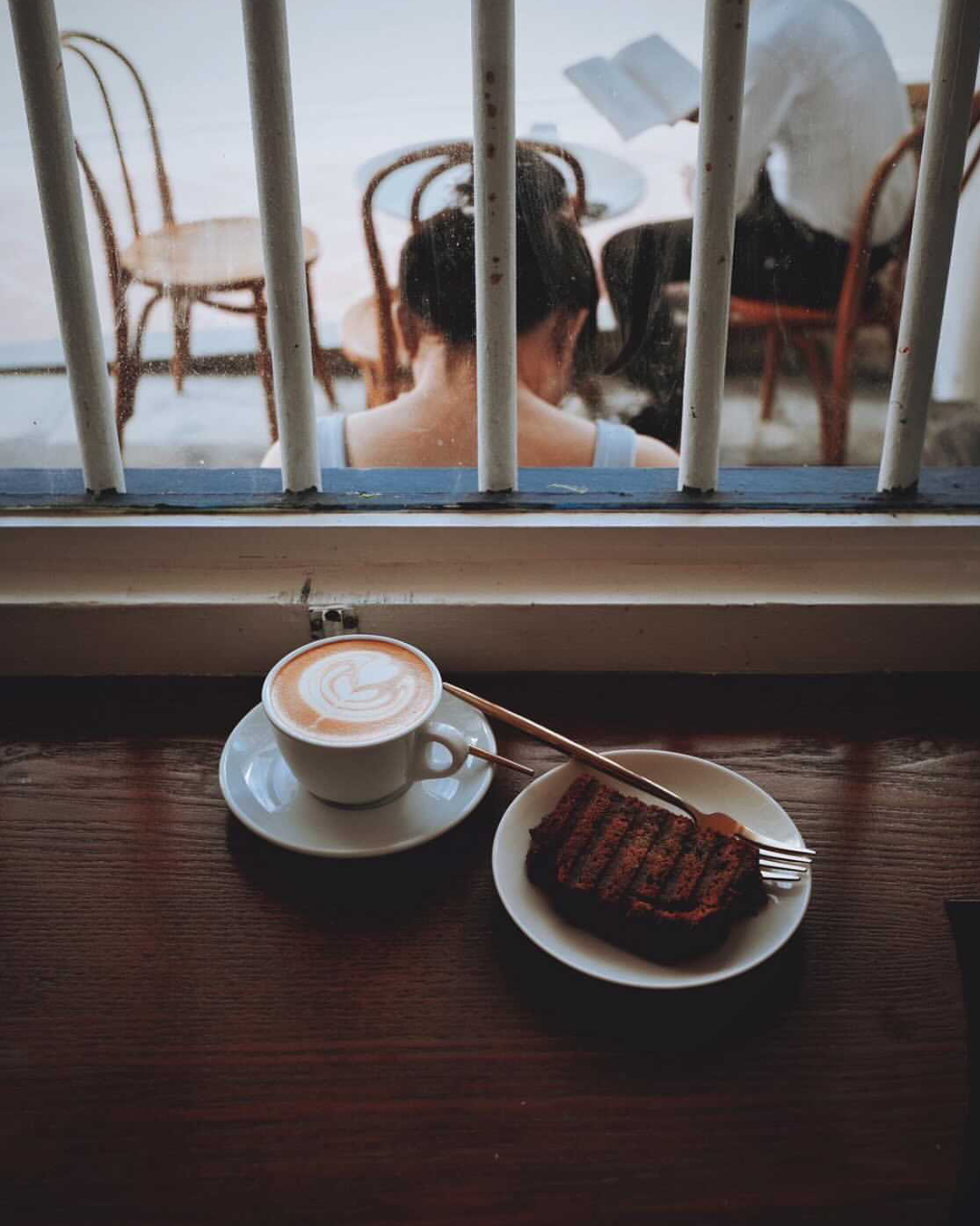 Coffee and cake served at Maxi Coffee Bar in Singapore.