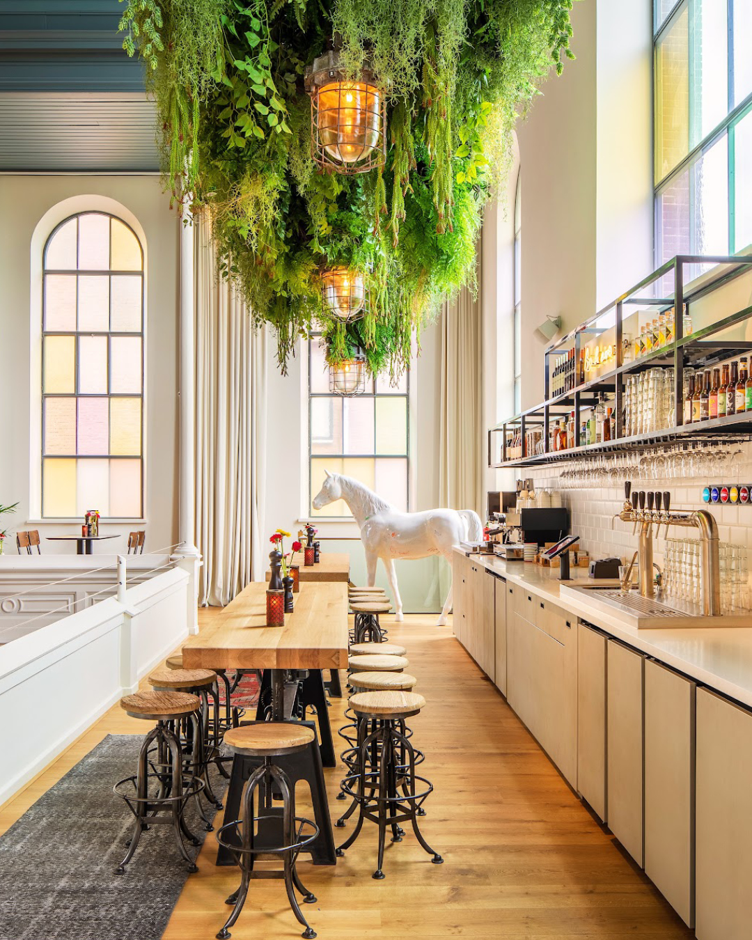 Eating area along the gallery at Bunk Hotel, Utrecht.