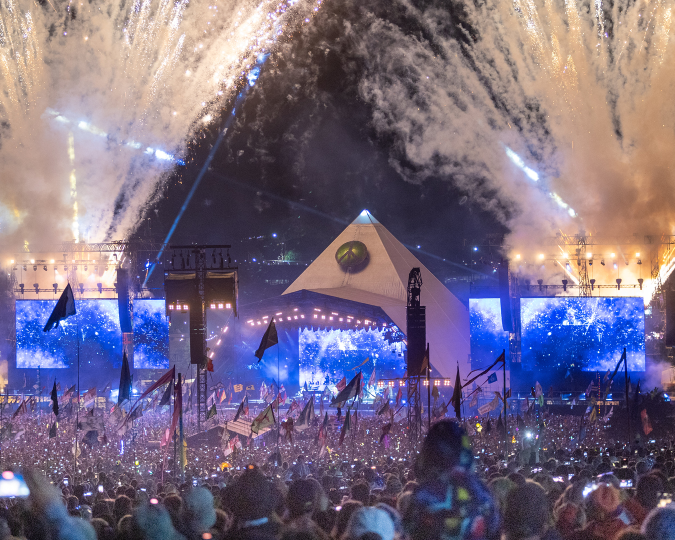 Fireworks flank the Pyramid Stage at Glasonbury in Somerset