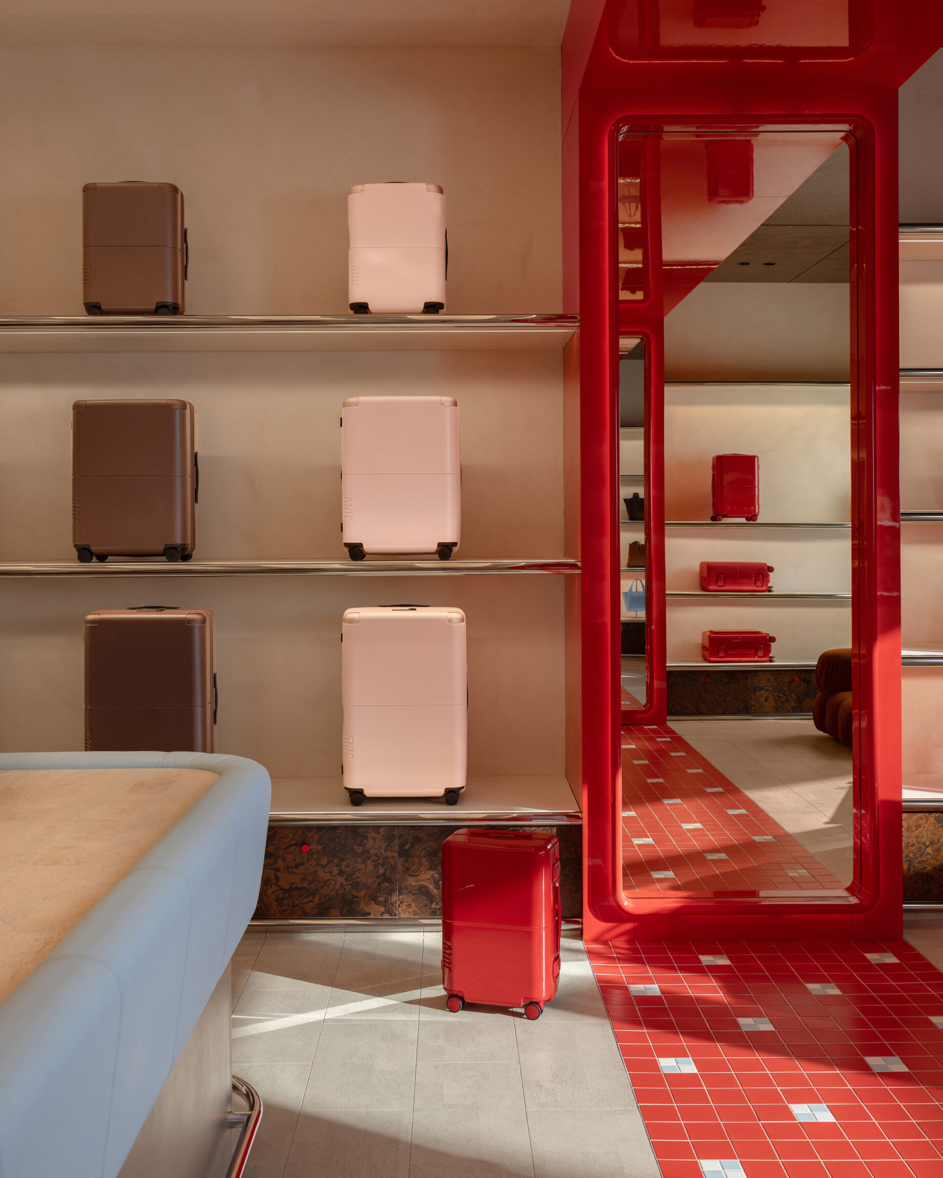 Vibrant interiors and suitcases inside July store in Melbourne, Australia.