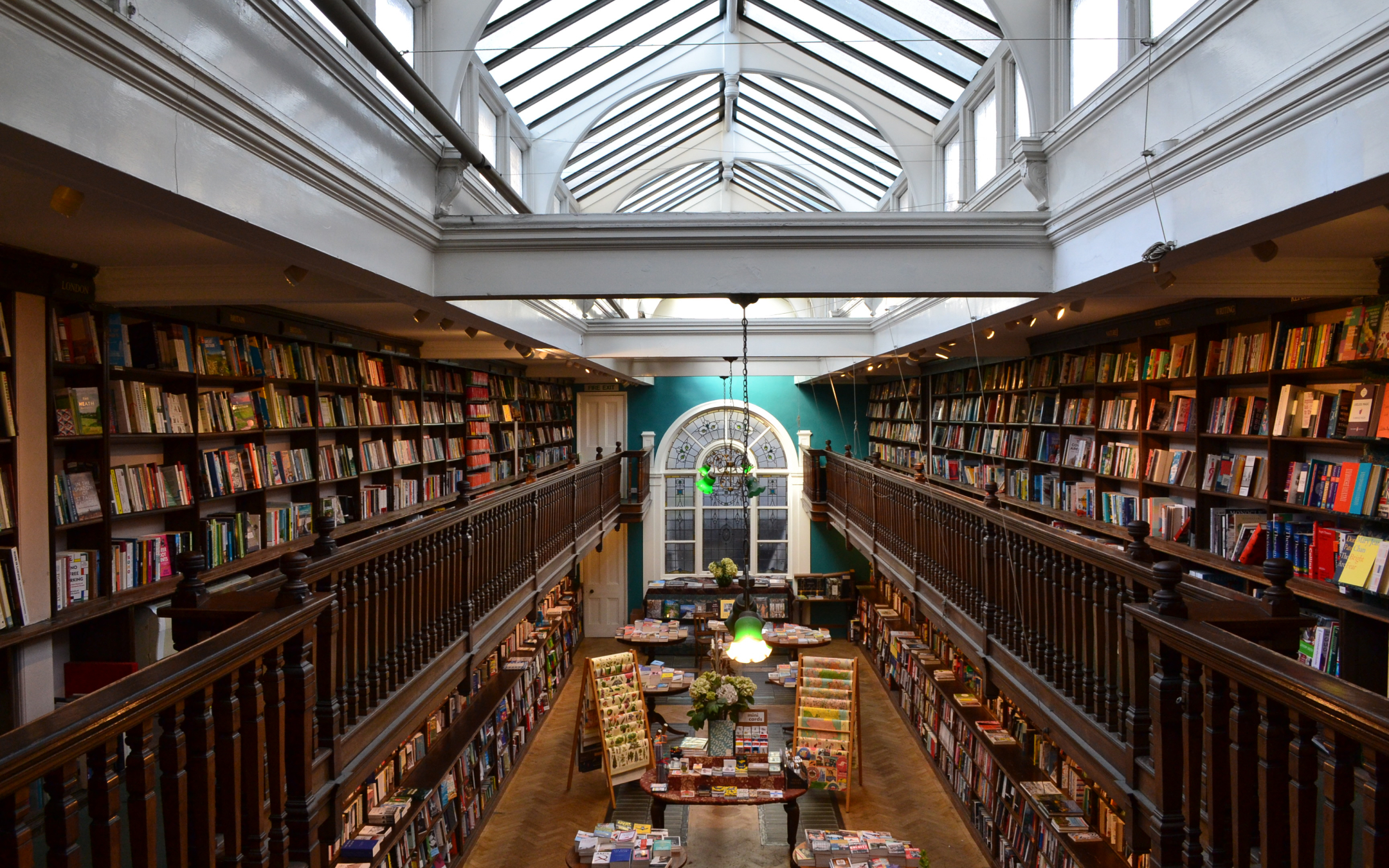 Oak galleries and stain glass windows at Daunt Books in Marylebone