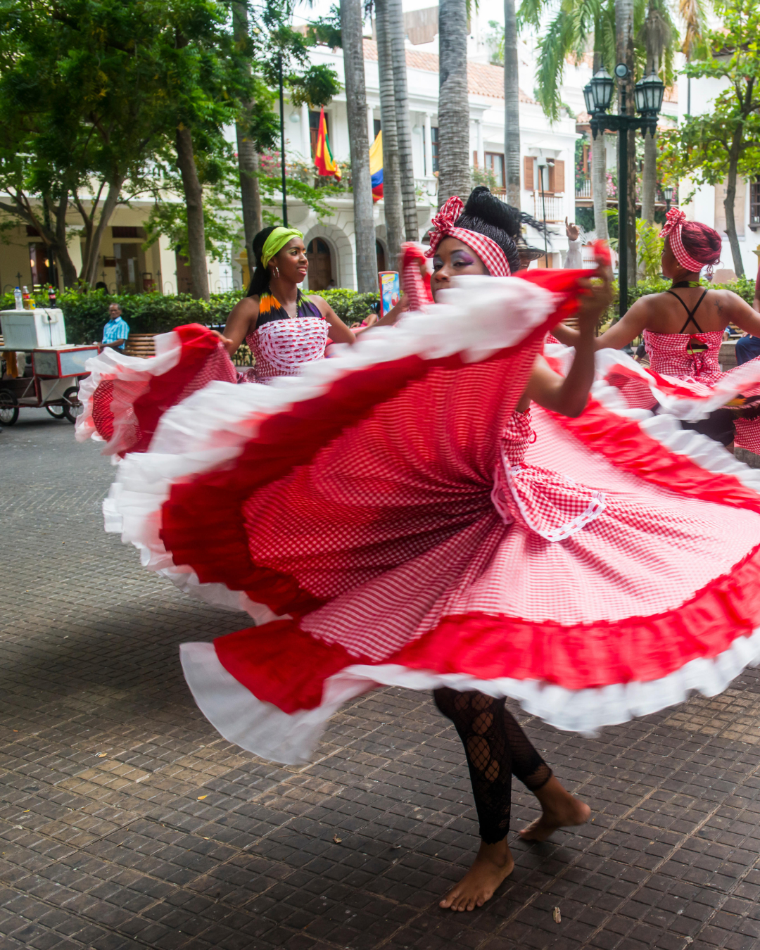 A woman dancing on the street in Colombia