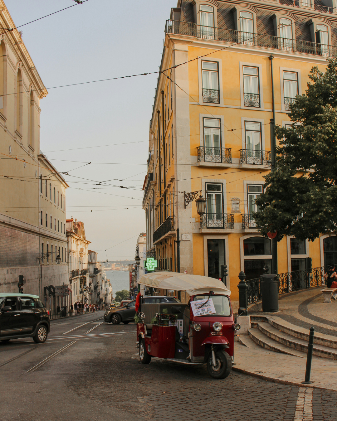 A cobbled street in Lisbon, Portugal, pictured at sunset