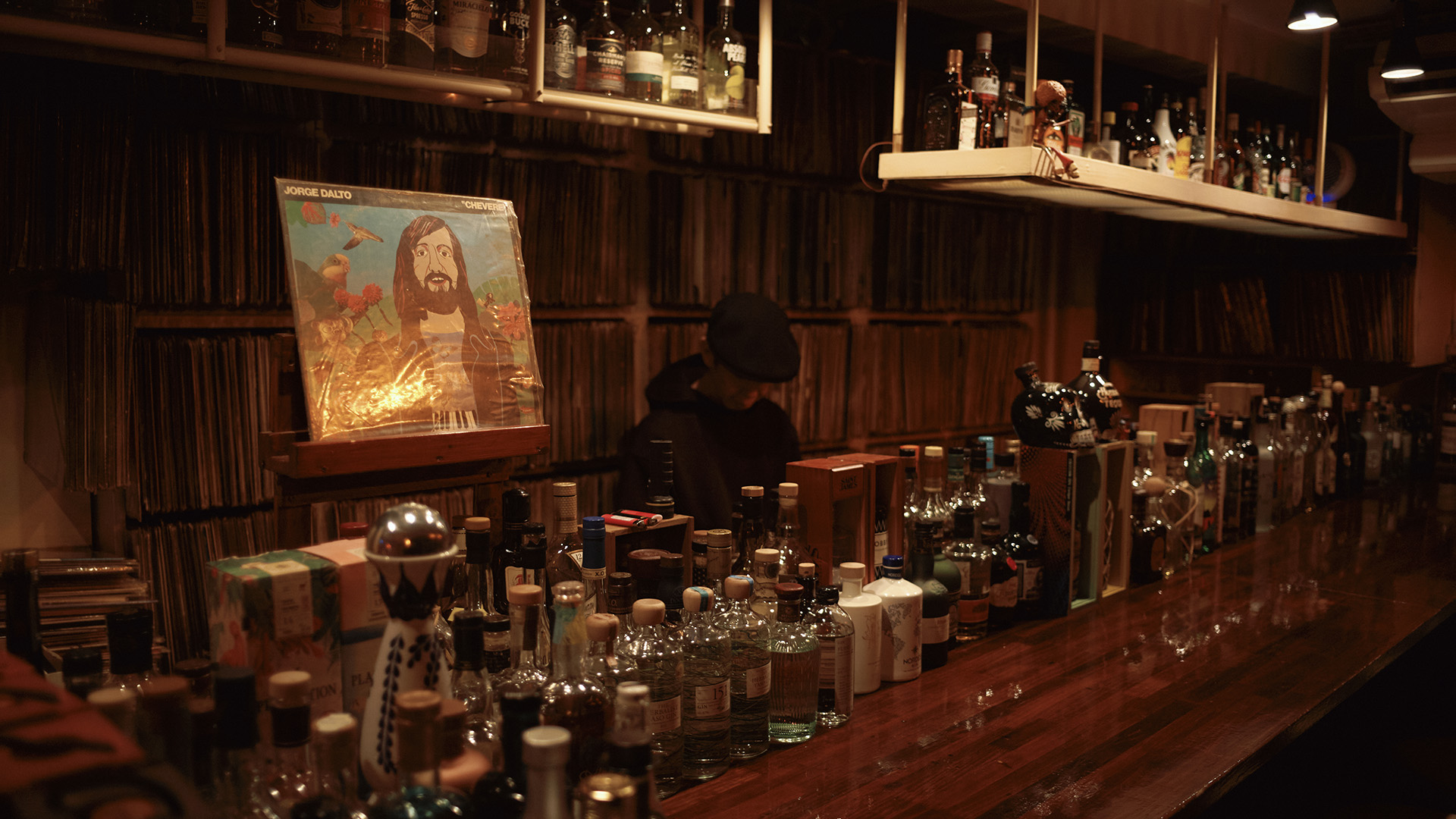 Spirit bottles lined up at Little Soul Cafe in Tokyo