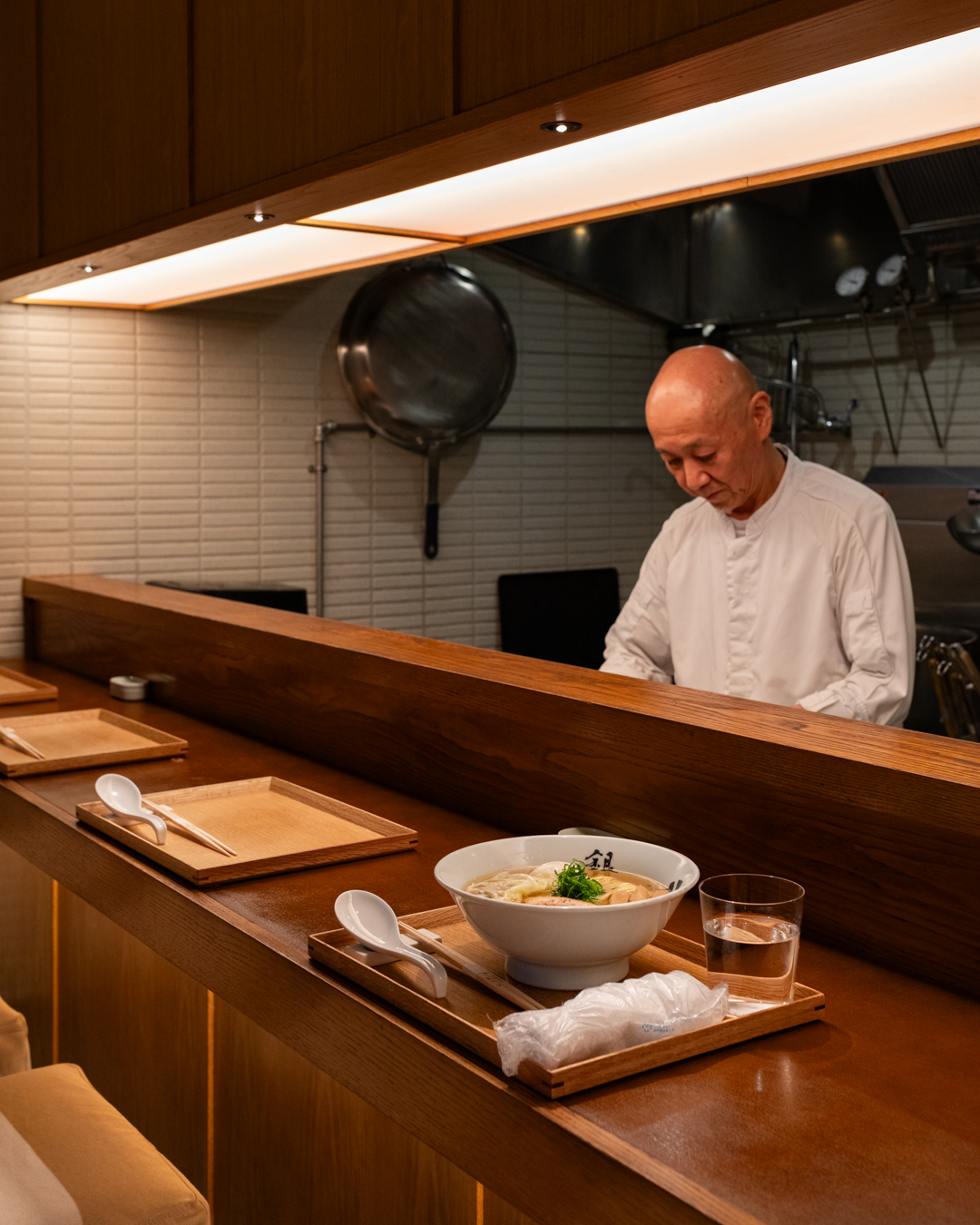 A chef at Ginza Hachigou. Photography by Yuuki Tadokoro