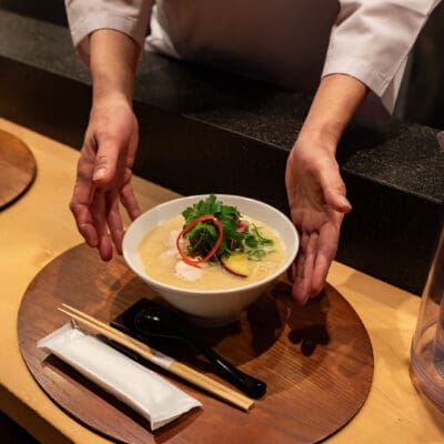 A bowl of ramen being served at Kangari, Ginza. Photography by Yuuki Tadokoro