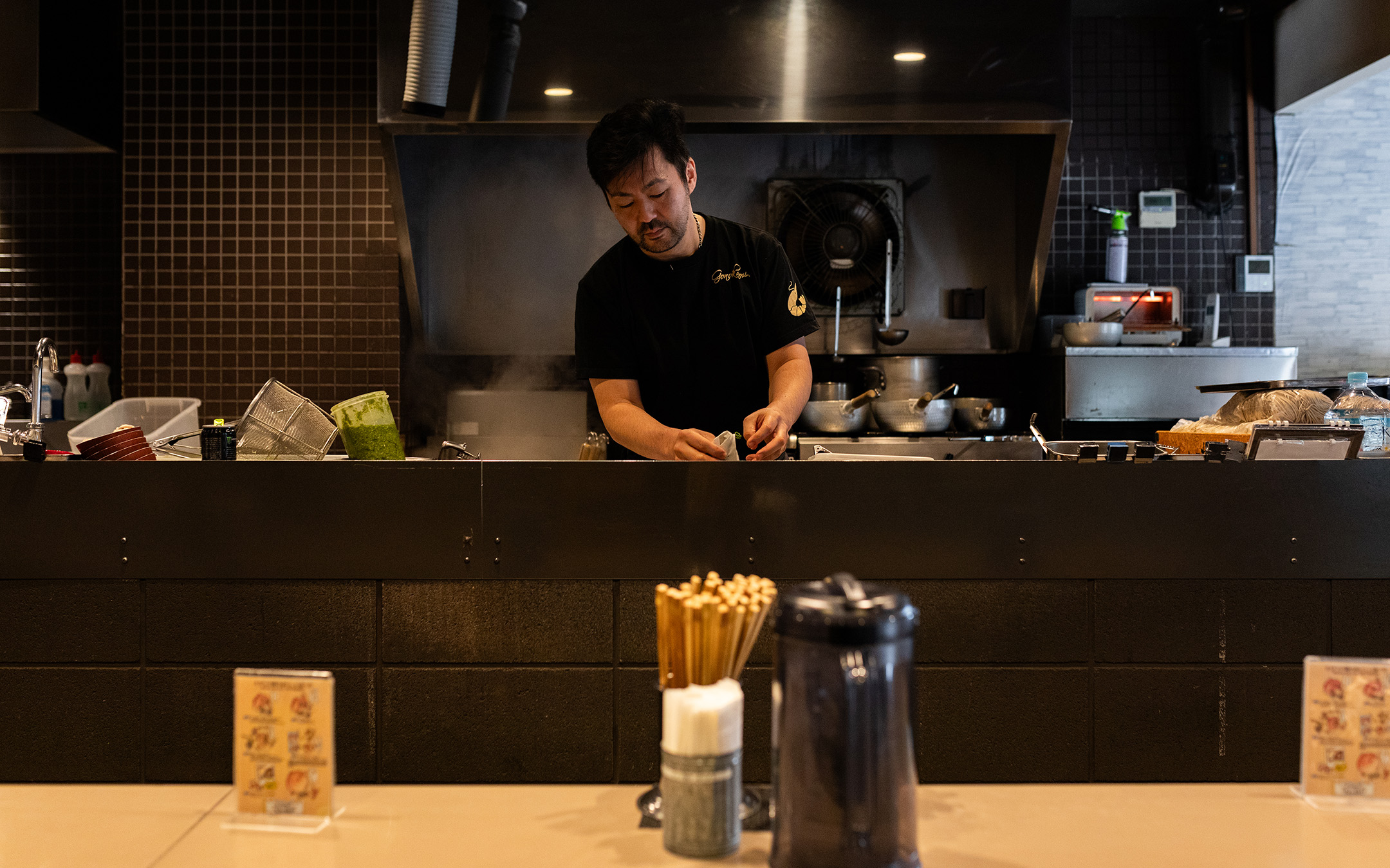 A chef at work at Tsukemen Gonokami Seisakujo ramen restaurant